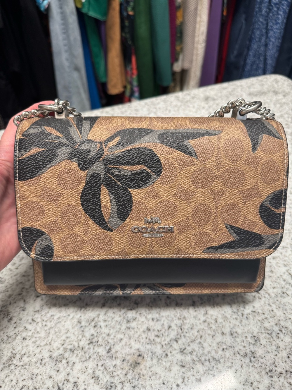 Coach Brown Signature Canvas Crossbody with Black Floral Print